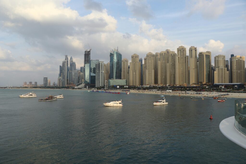 Dubai Trip Under ₹50,000 (2026 Budget Guide) Explore the breathtaking skyline of Dubai Marina with luxury yachts in the foreground, capturing the essence of Dubai